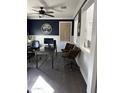 Modern home office with a large desk and comfortable seating at 2738 E Cherry Hill E Dr, Gilbert, AZ 85298