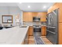 Modern kitchen with stainless steel appliances and quartz countertops at 16 W Encanto Blvd # 609, Phoenix, AZ 85003