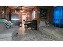 Cozy living room featuring a sofa and dining area at 3017 W Almeria Rd, Phoenix, AZ 85009