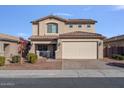 Two-story house with a beige exterior, two-car garage, and landscaping at 480 W Cucumber Tree Ave, Queen Creek, AZ 85140