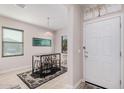 Small dining area with a modern table and four bar stools at 20609 N Wilford Ave, Maricopa, AZ 85138