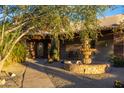 Landscaped courtyard with fountain and pathway at 35931 N 82Nd Pl, Scottsdale, AZ 85266