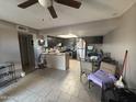 Eat-in kitchen with dark cabinets and a breakfast bar at 706 N 4Th St # 2, Avondale, AZ 85323