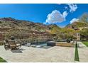 Stunning backyard with a pool, spa, and mountain views at 13454 N Stone View Trl, Fountain Hills, AZ 85268