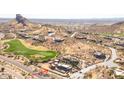 Expansive desert property boasting a modern home, verdant green golf course, and mountain views at 3703 S Avenida De Angeles --, Gold Canyon, AZ 85118