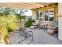 Covered patio with comfortable seating, perfect for relaxing at 17103 S 182Nd Ln, Goodyear, AZ 85338