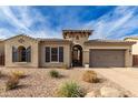 Beautiful one-story home with a charming facade and landscaping at 22898 N 94Th Ln, Peoria, AZ 85383