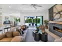 Living room with fireplace and sliding doors to the backyard pool at 4511 N 38Th Pl, Phoenix, AZ 85018