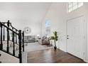 Bright living room with hardwood floors and a high ceiling at 7270 W Tina Ln, Glendale, AZ 85310