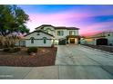 Beautiful two-story home with a large driveway and landscaping at 851 E Birchwood Pl, Chandler, AZ 85249