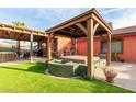 Backyard with hot tub, gazebo, and patio furniture at 944 W Diamond Dr, Tempe, AZ 85283