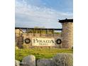 Entrance to Peralta Trails community with stonework and signage at 10105 E Meandering Trail Ln, Gold Canyon, AZ 85118