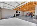 Interior view of the garage with ample storage at 11120 E Grove St, Mesa, AZ 85208
