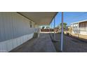 Covered patio area adjacent to manufactured home at 18002 N 20Th N Pl, Phoenix, AZ 85022
