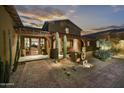 Desert landscaping surrounds this beautiful home's entrance at 38450 N 95Th Way, Scottsdale, AZ 85262