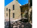 Complex exterior showing building and stairway access at 4950 N Miller Rd # 210, Scottsdale, AZ 85251