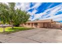 Front yard view of a single story home with driveway at 74 S 94Th Pl, Chandler, AZ 85224