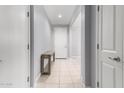 Bright entryway with tile floors and a console table at 808 W Brangus Way, San Tan Valley, AZ 85143