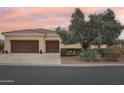 Two-car garage and nicely landscaped front yard at 13219 W Santa Ynez Dr, Sun City West, AZ 85375