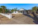 Newly renovated home with a spacious front yard at 3212 W Jackson St, Phoenix, AZ 85009