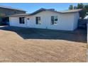 Newly renovated single story home with a clean, modern design and spacious yard at 8323 W Devonshire Ave, Phoenix, AZ 85037