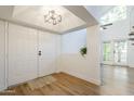 Bright and airy entryway with double doors and light wood floors at 18811 N 19Th Ave # 3018, Phoenix, AZ 85027
