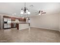 Spacious open floor plan featuring updated kitchen and an expansive living area at 2233 N Middlecoff Dr, Mesa, AZ 85215