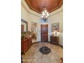 Spacious entryway with wood flooring and unique decor at 3525 E Robin Ln, Phoenix, AZ 85050