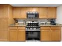Modern kitchen with stainless steel appliances at 3825 E Camelback Rd # 290, Phoenix, AZ 85018
