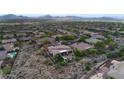 Aerial view of house and surrounding community at 42034 N Harbour Town Ct, Anthem, AZ 85086