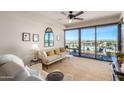 Spacious living area with floor-to-ceiling windows and city views at 4422 N 75Th St # 7009, Scottsdale, AZ 85251