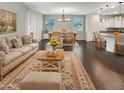 Spacious living room features hardwood floors and an open floor plan at 4738 E Tierra Buena Ln, Phoenix, AZ 85032