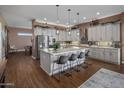 Modern kitchen with island, stainless steel appliances, and ample counter space at 15848 E Palomino Blvd, Fountain Hills, AZ 85268