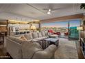 Open living room with access to a large deck and scenic views at 15848 E Palomino Blvd, Fountain Hills, AZ 85268