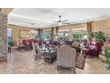 Spacious living area with tile floors, large windows, and comfortable seating at 18059 W Tierra Del Sol Dr, Surprise, AZ 85387