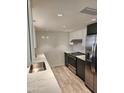 Modern kitchen with stainless steel appliances and white subway tile at 12432 W Fieldstone Dr, Sun City West, AZ 85375