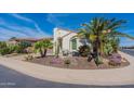 Single story home with landscaped yard and driveway at 1806 E Azafran Trl, Queen Creek, AZ 85140