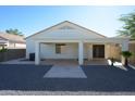 Covered patio, gravel landscaping, and a fenced-in area at 2732 W Lamar Rd, Phoenix, AZ 85017