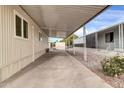 Covered driveway and walkway to mobile home at 300 S Val Vista Dr # 152, Mesa, AZ 85204