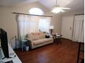 Living room features wood flooring and neutral colors at 9333 E University Dr # 196, Mesa, AZ 85207
