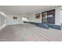 Covered carport area next to mobile home entrance at 977 S Oxide Dr # 977, Apache Junction, AZ 85119