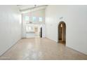 Bright living room with vaulted ceilings and tile floors at 2227 E Catalina Dr, Phoenix, AZ 85016