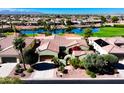 Aerial view of single-story home near lake at 23206 N Del Monte Dr, Sun City West, AZ 85375