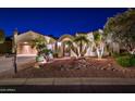 Stunning Spanish-style home with beautifully landscaped grounds at 23206 N Del Monte Dr, Sun City West, AZ 85375