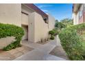 Building exterior showcasing landscaping and walkway at 3828 N 32Nd St # 120, Phoenix, AZ 85018
