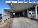 Covered carport with brick pavers and side walls at 650 N Hawes Rd # 3702, Mesa, AZ 85207