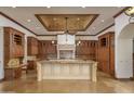 Gourmet kitchen features granite counters and custom cabinetry at 7150 N 64Th Pl, Paradise Valley, AZ 85253