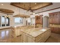 Open kitchen boasts double islands and breathtaking views at 7150 N 64Th Pl, Paradise Valley, AZ 85253