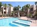 Community pool and spa with palm trees at 11333 N 92Nd St # 2094, Scottsdale, AZ 85260