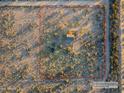 Aerial view showing property boundaries of home in desert setting at 12866 W Sun Ave, Eloy, AZ 85131
